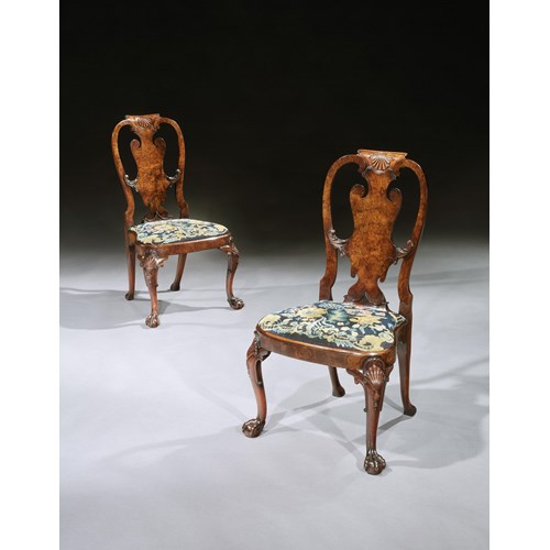 A pair of walnut side chairs